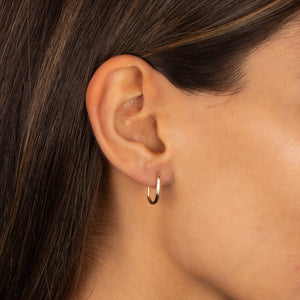 Elongated Oval Huggie Hoop 14K