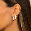  CZ Solitaire Elongated Oval Shape Huggie Earring - Adina Eden's Jewels