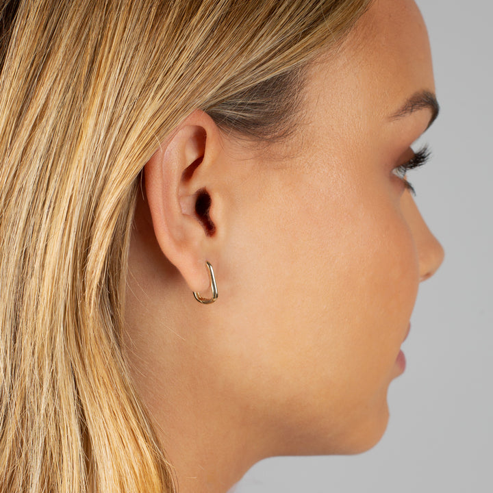  Solid Oval Shaped Huggie Earring - Adina Eden's Jewels
