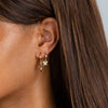  CZ Rainbow Cross Huggie Earring - Adina Eden's Jewels